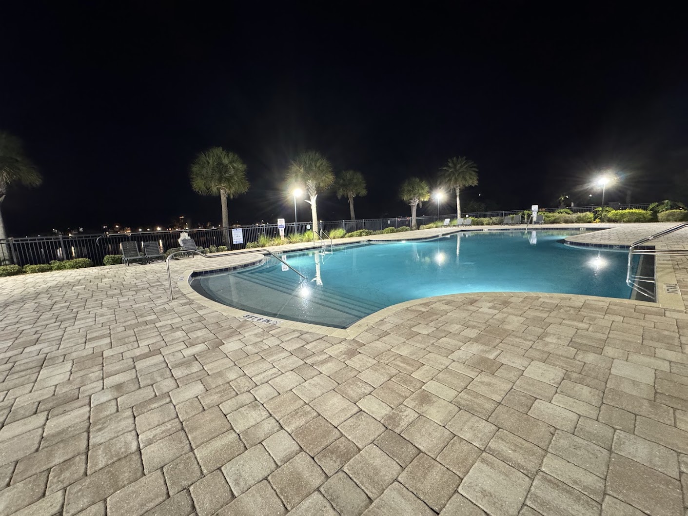 Renovated pool with new pool lights at night
